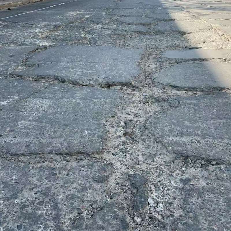 夹江路面起砂露石子修补料